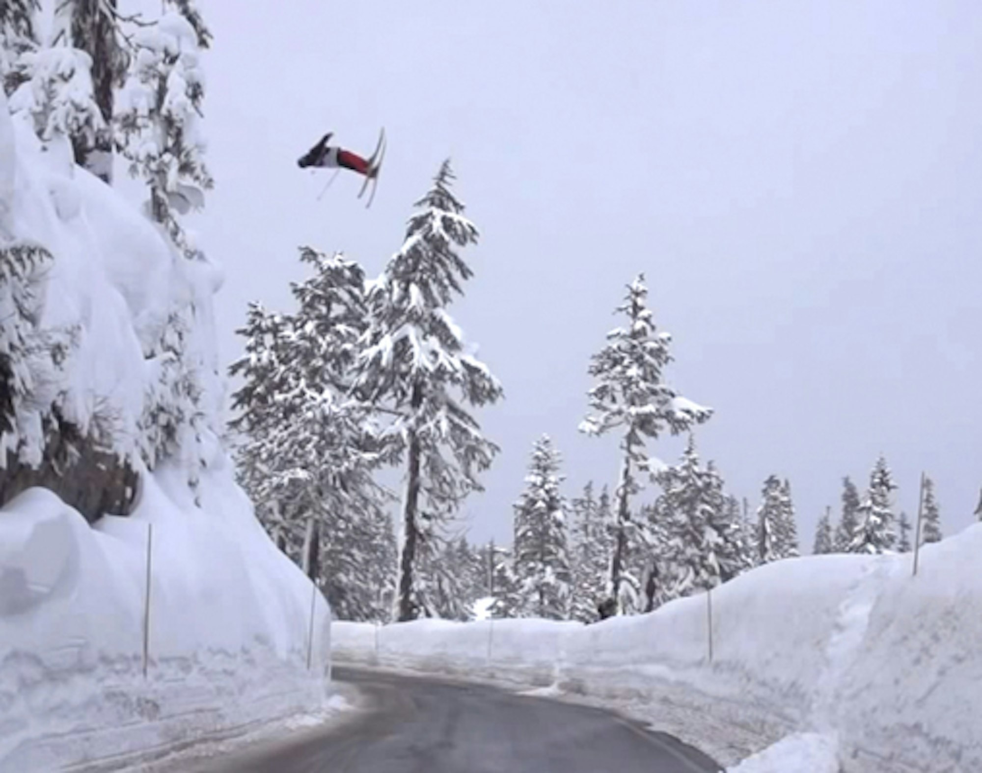 Skier under-rotates backflip over Baker road gap, fantastic faceplant ensues