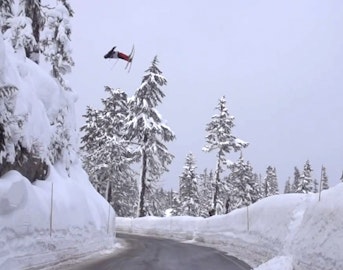 Skier under-rotates backflip over Baker road gap, fantastic faceplant ensues