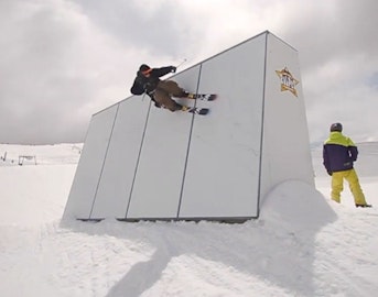Postman Laurent De Martin licks the stamp, sends it at Les Deux Alpes