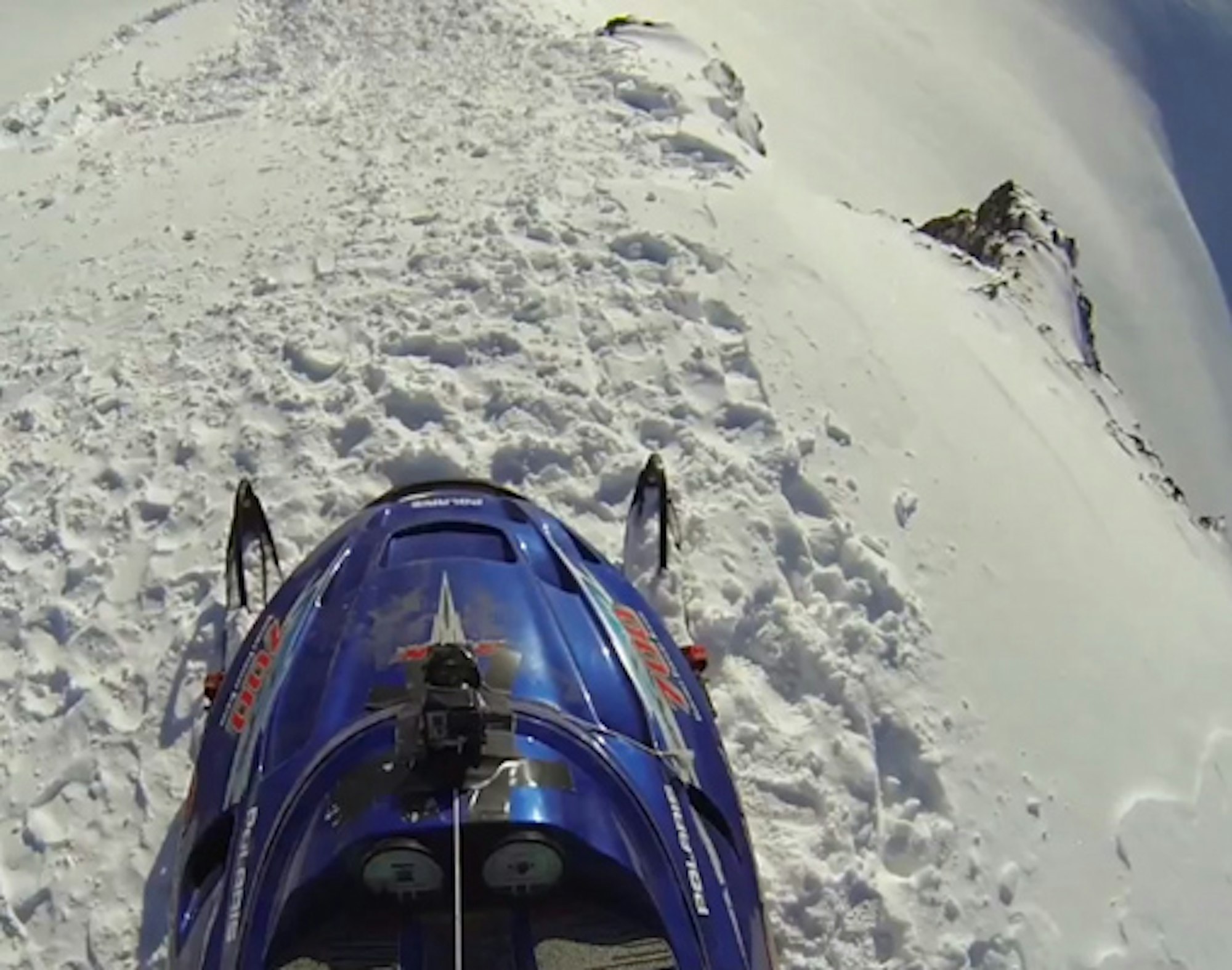 Erik Roner jumps Shane McConkey's snowmobile off 800-ft cliff