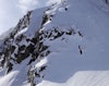 Skier miscalculates takeoff, sends it over cliff onto rocks