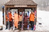 Skiers waiting for the bus