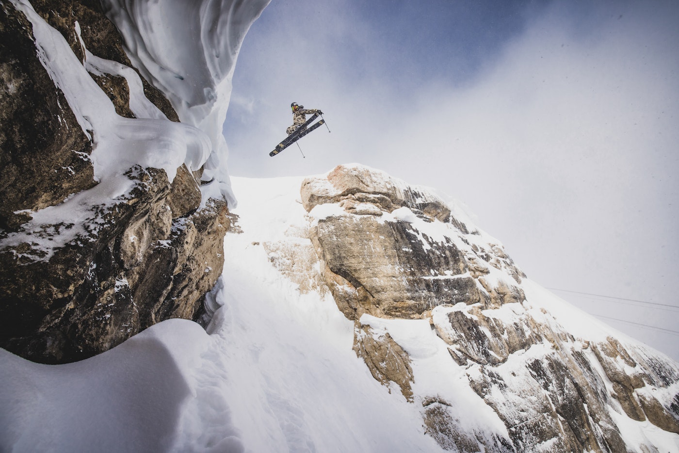 Skier jumping into Jackson Hole Resort's Corbet's Couloir