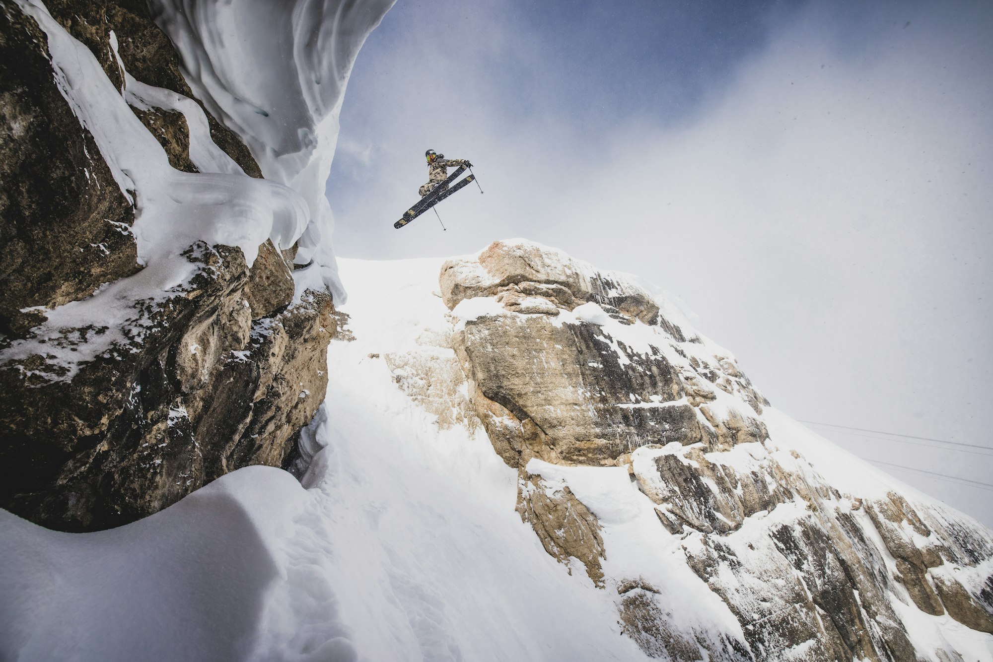Skier jumping into Jackson Hole Resort's Corbet's Couloir