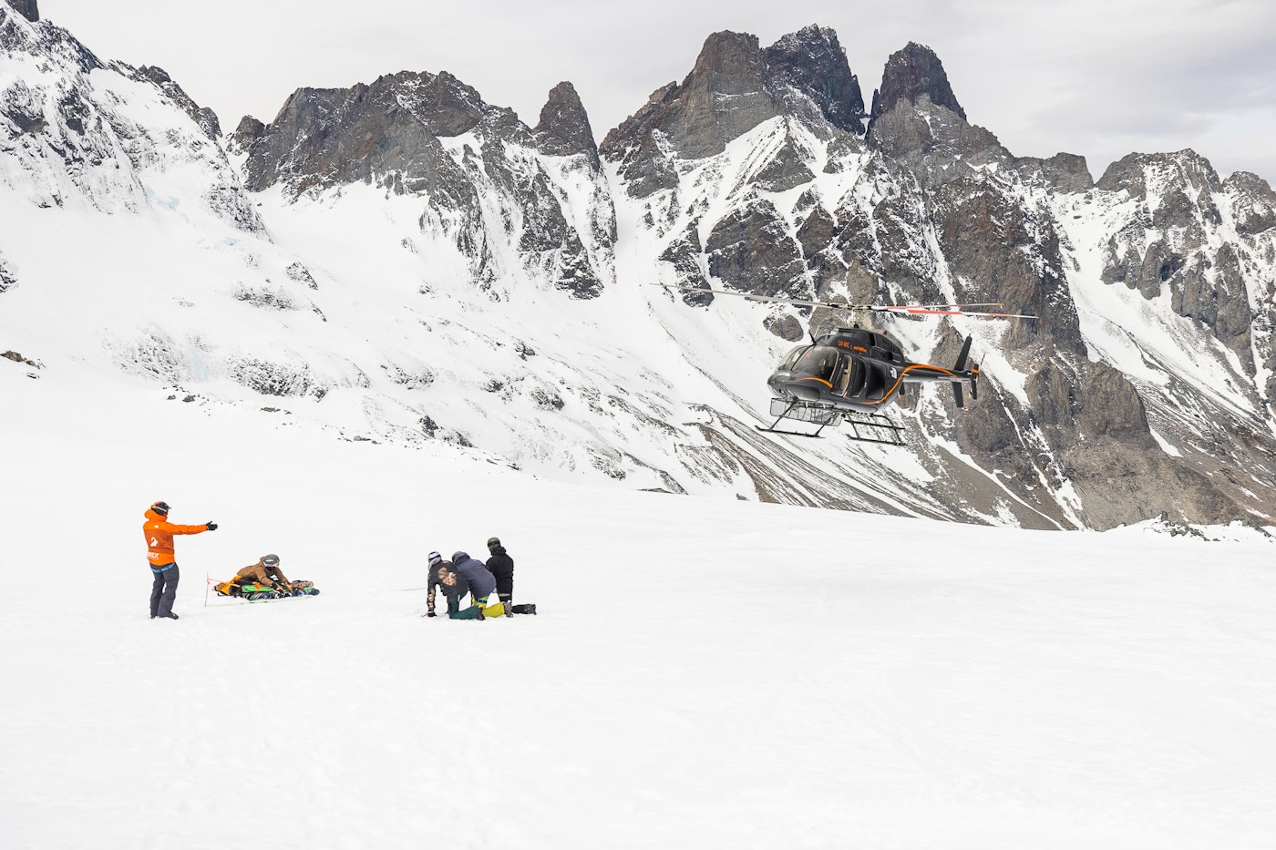 Helicopter taking off after dropping off skiers in Patagonia