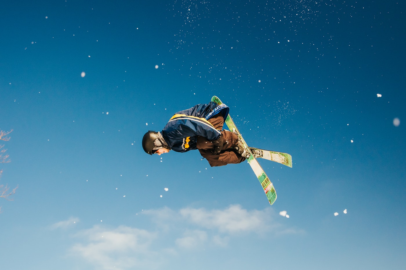 Skier hitting a trick off of a jump at Granite Peak.