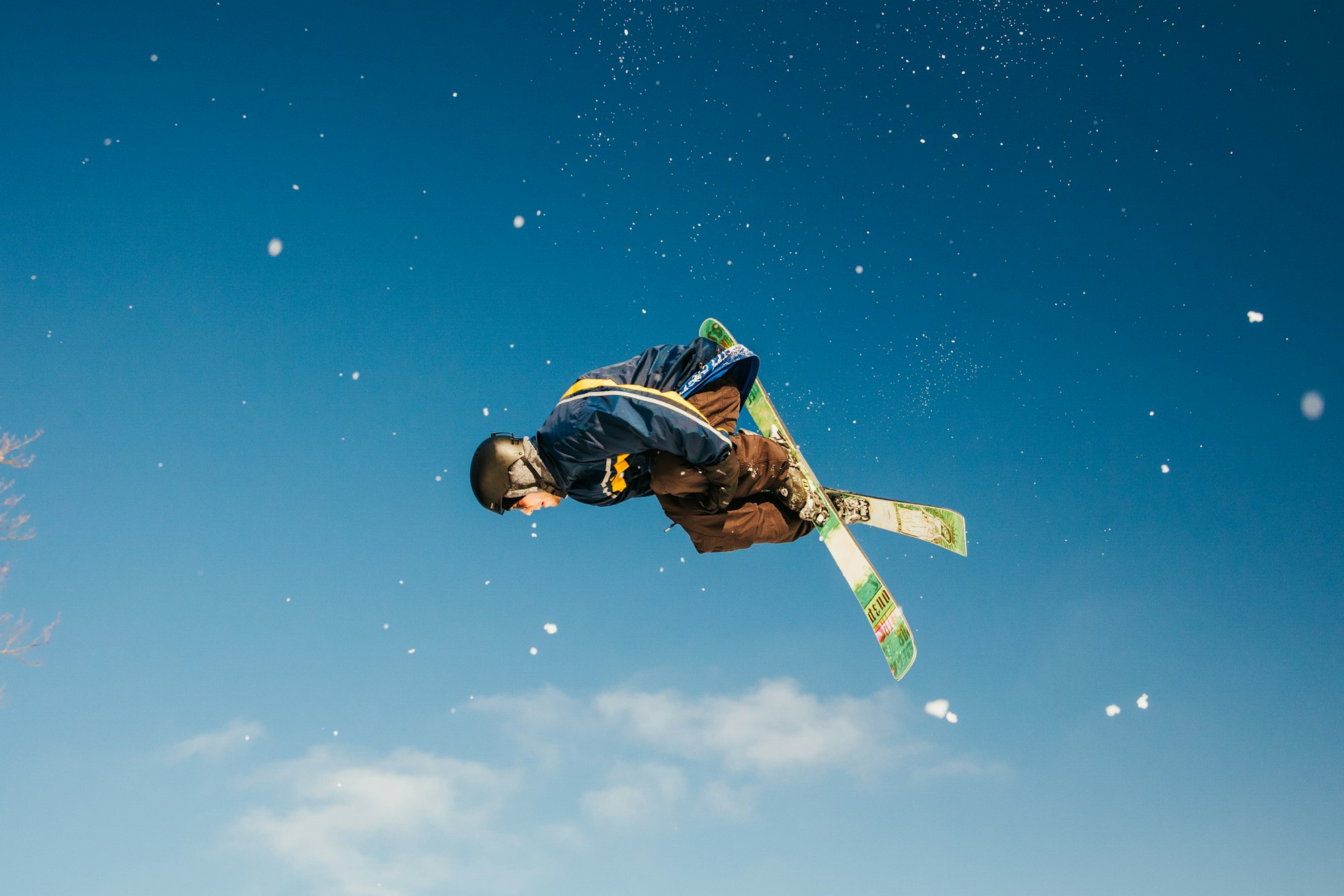 Skier hitting a trick off of a jump at Granite Peak.