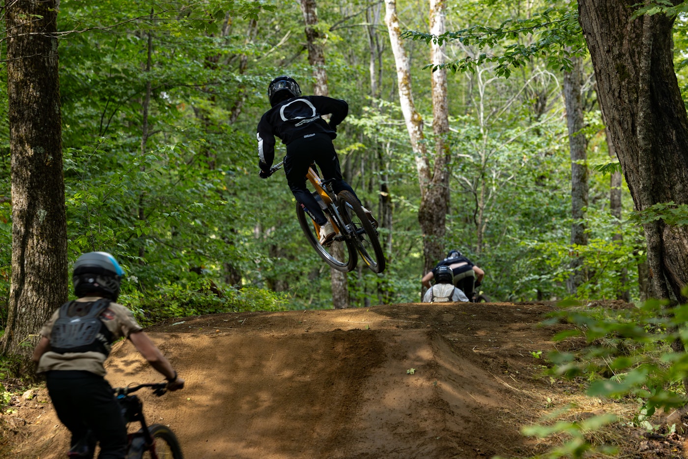 Mountain bikers riding Killington's trails.