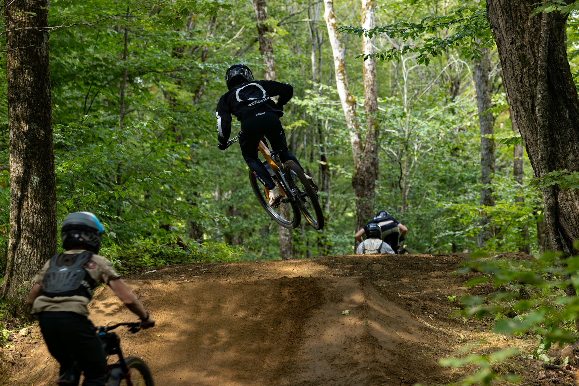 Mountain bikers riding Killington's trails.