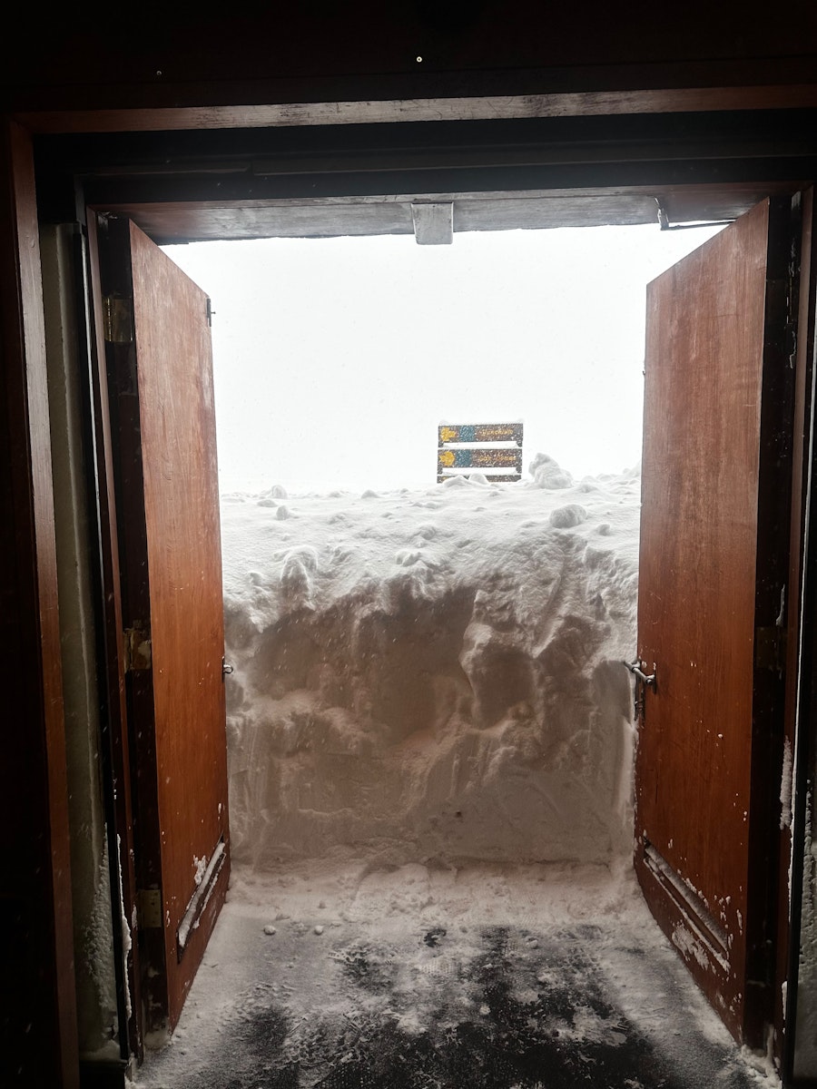 Doorway blocked with snow at Ski Portillo.
