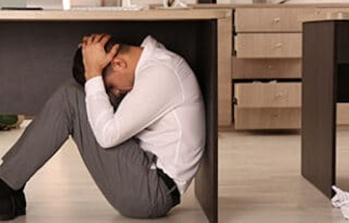 man under desk