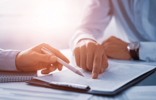 Persons discussing a contract