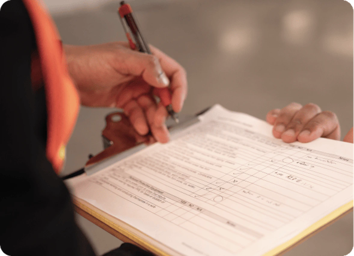 Health and safety checklist being completed during a workplace