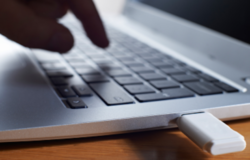 Employee copying confidential data on a USB drive
