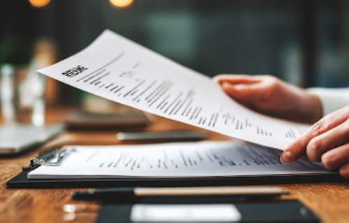Human recruiter assessing a resume