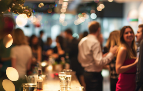 Co-workers mingling at an office holiday party