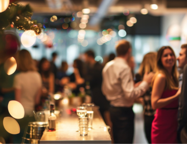 Co-workers mingling at an office holiday party