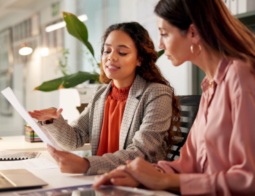 Peninsula advisor explaining the new legal changes to a small business owner