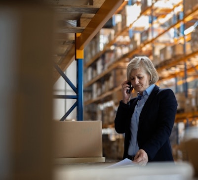 Businesswoman on phone with an advisor