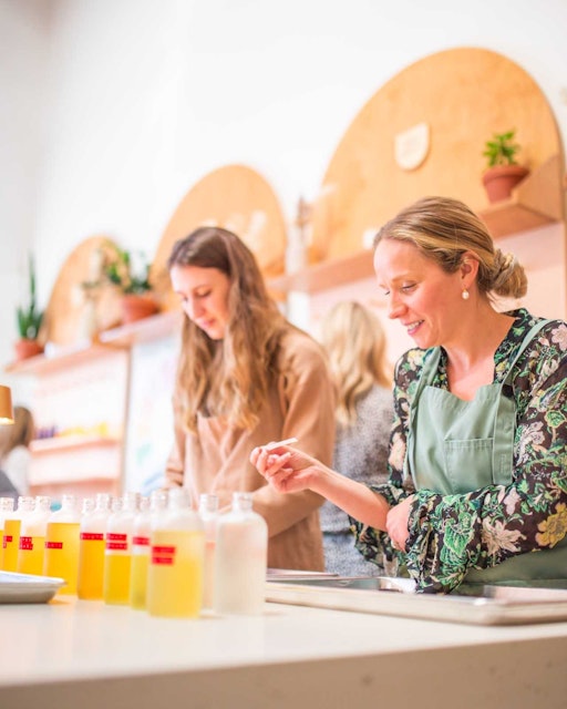 Milk Jar employees making candles
