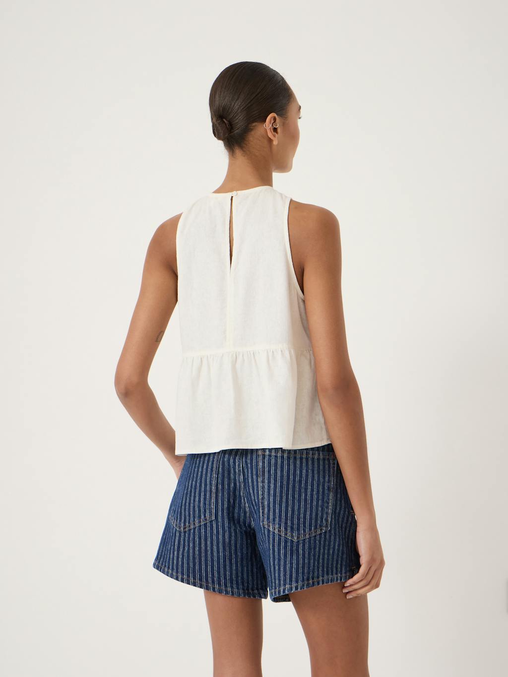 014594-0001-03 Nomie Halter Neck Linen Peplum Top