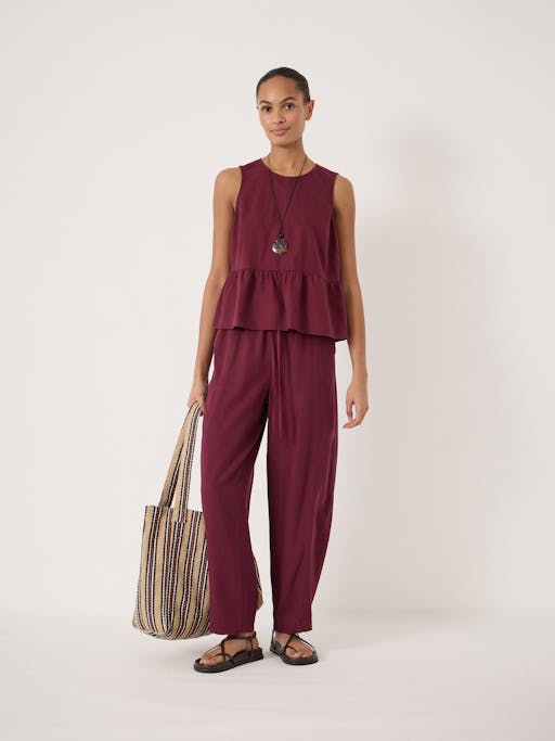 Nomie Sleeveless Linen Blend Peplum Top