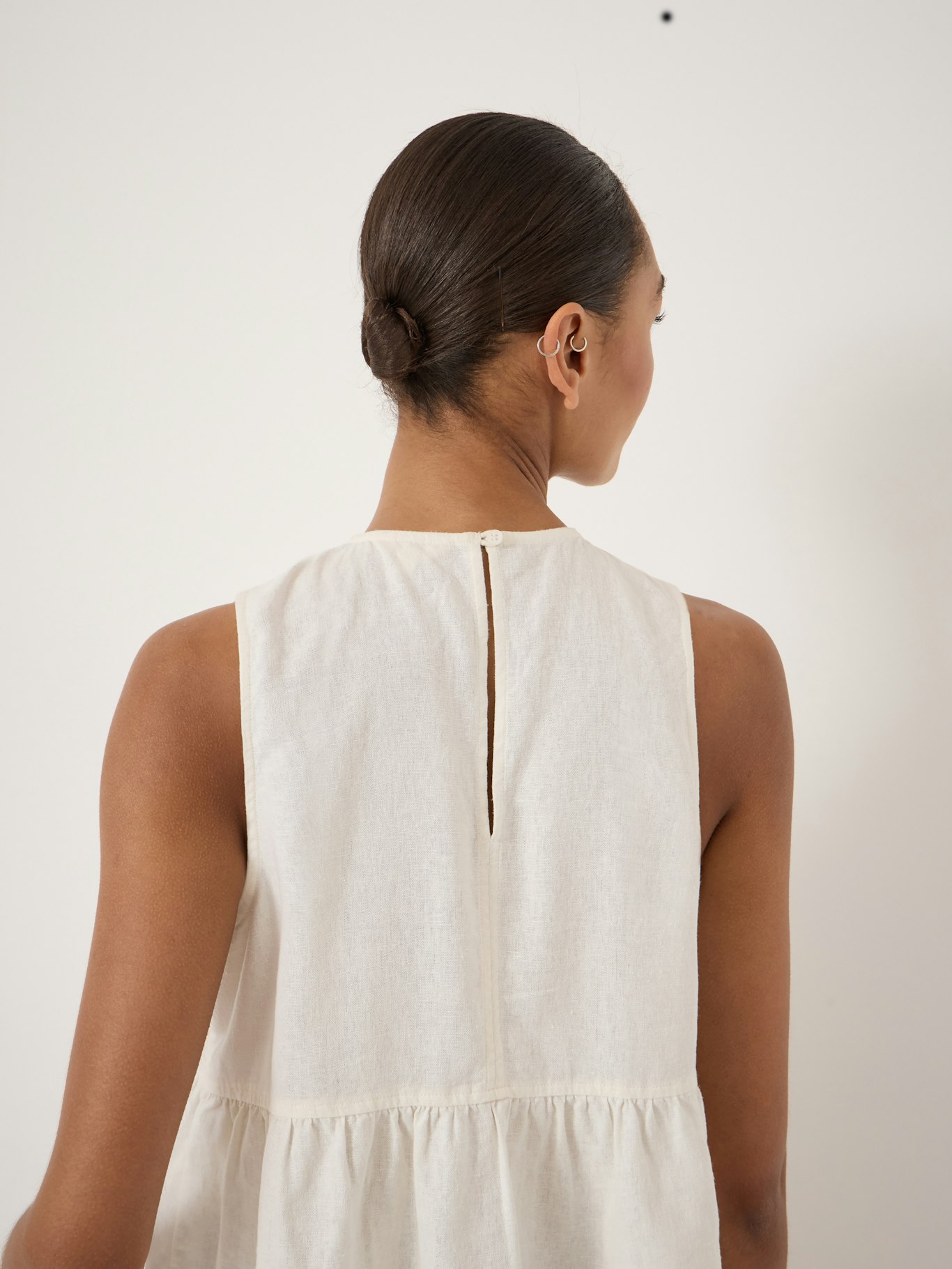 014594-0001-04 Nomie Sleeveless Linen Blend Peplum Top