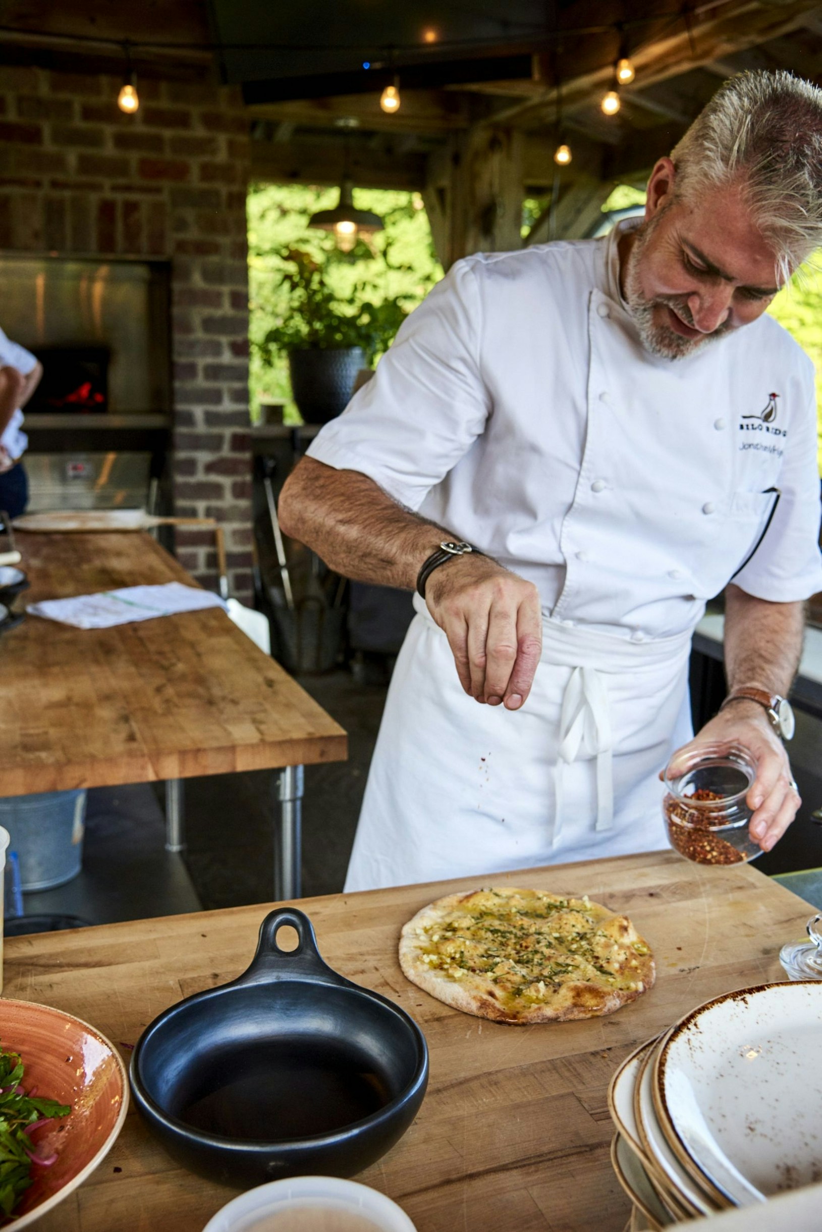 Chef Jonathan Wright serves an array of terrain-to-table foods from pizzas to fresh sourdough and pate.