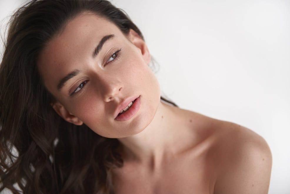 woman tilting her head to the side