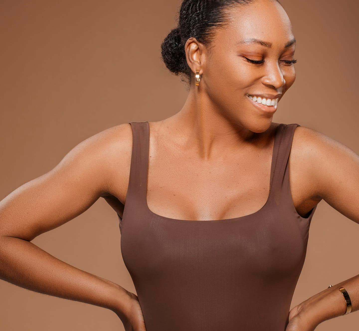 woman in a brown top