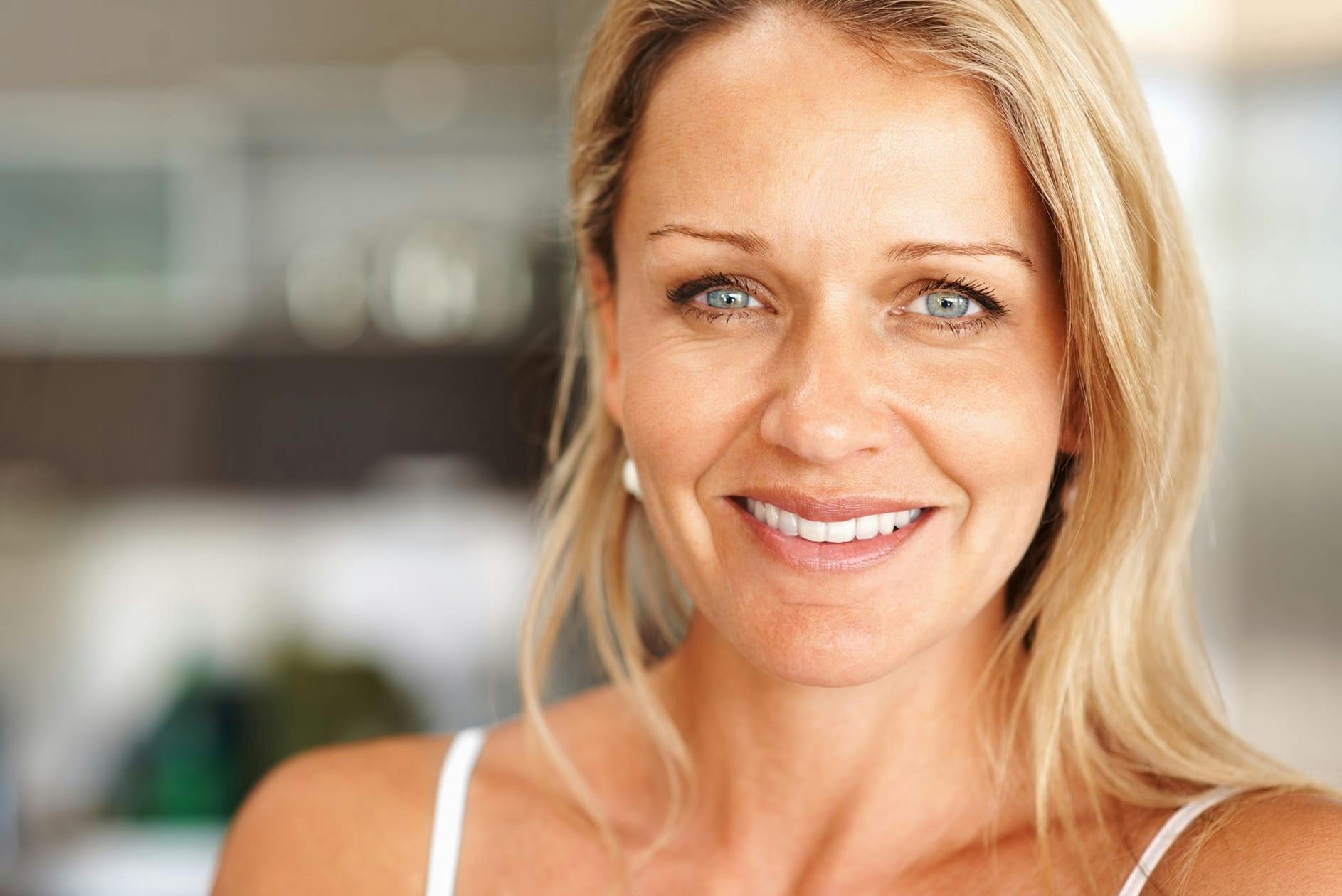 woman with blonde hair smiling