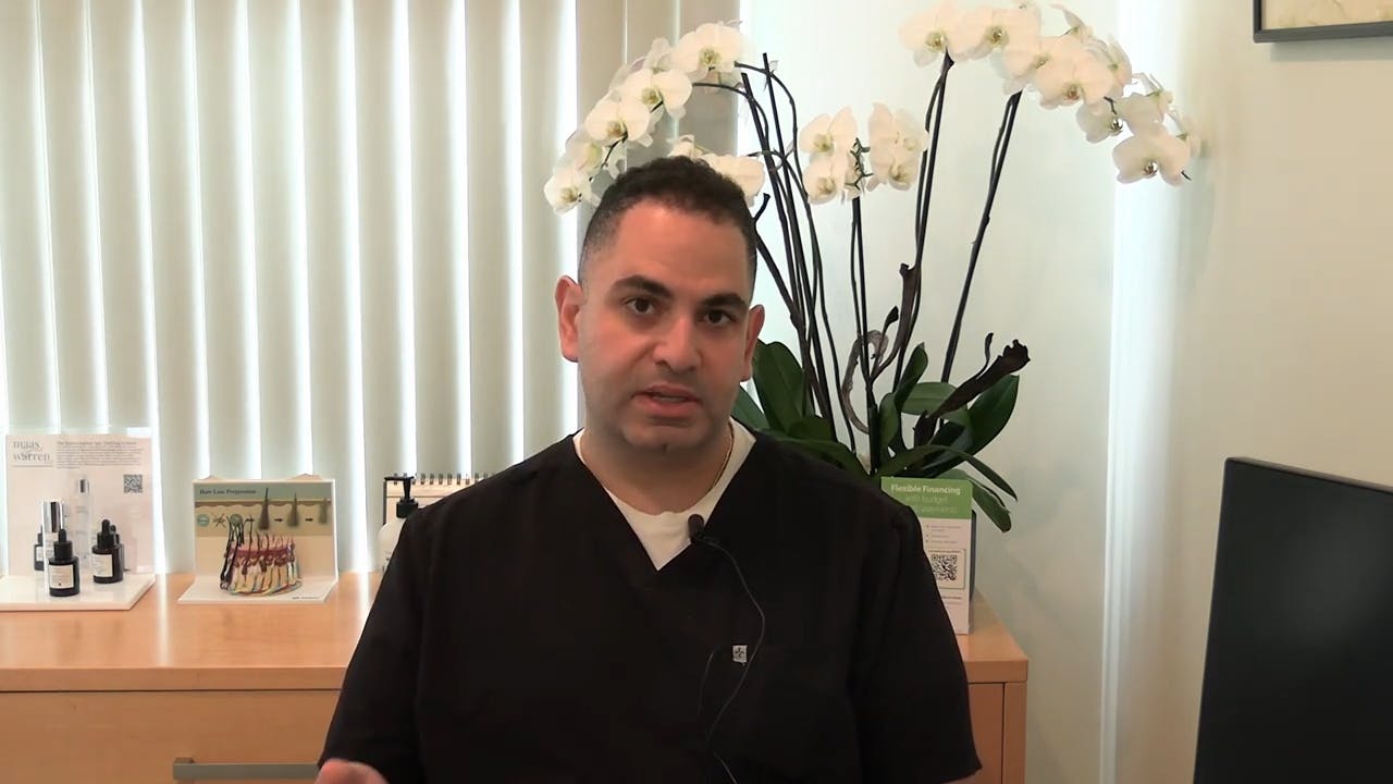 doctor speaking about breast augmentation