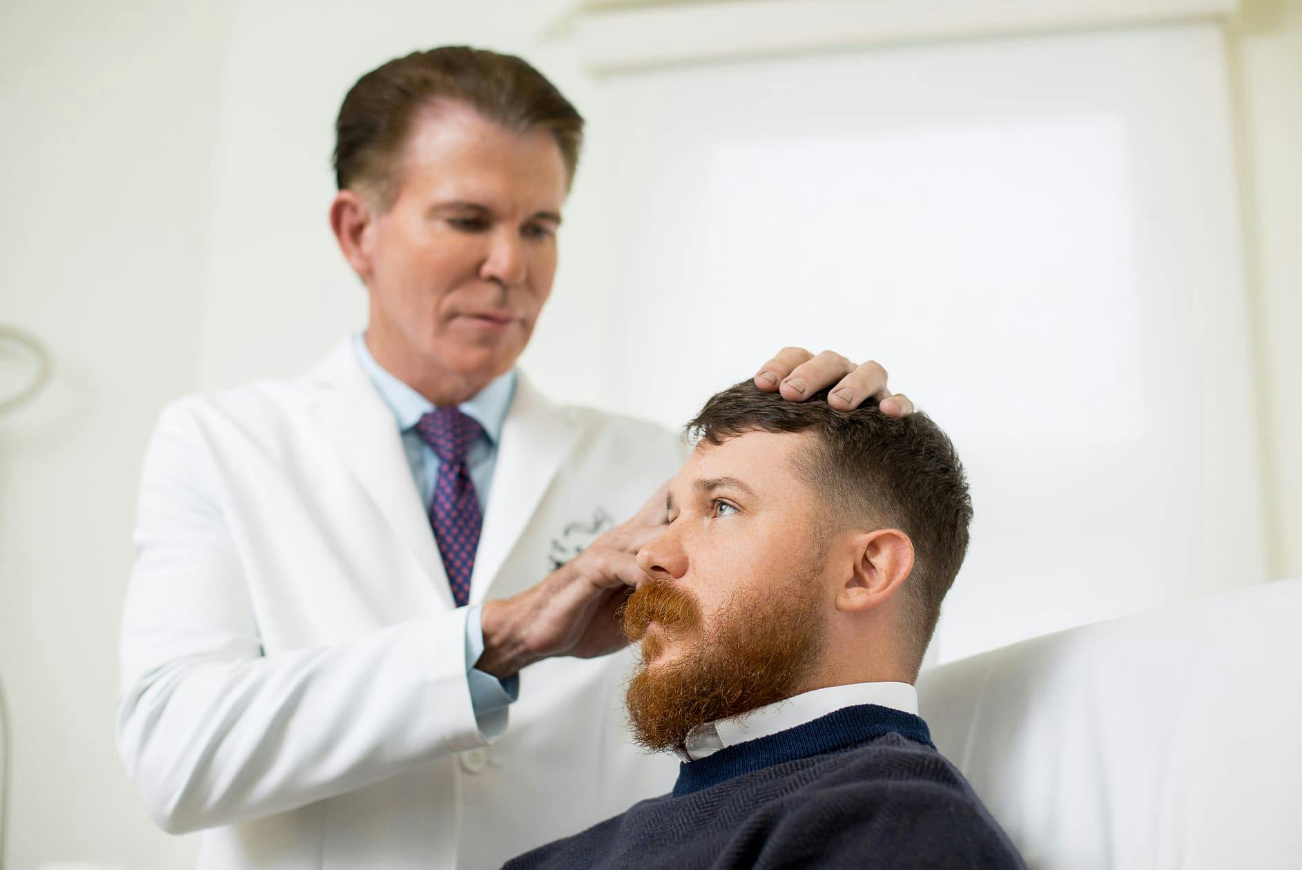 Dr. Maas examing patient