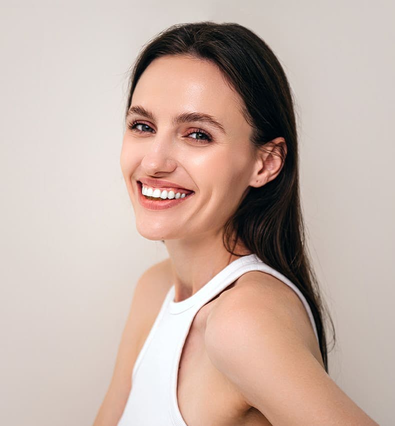 woman with dark hair smiling