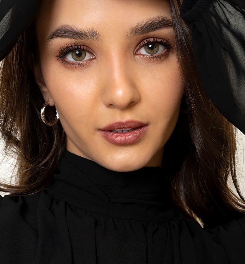 woman looking forward in black attire