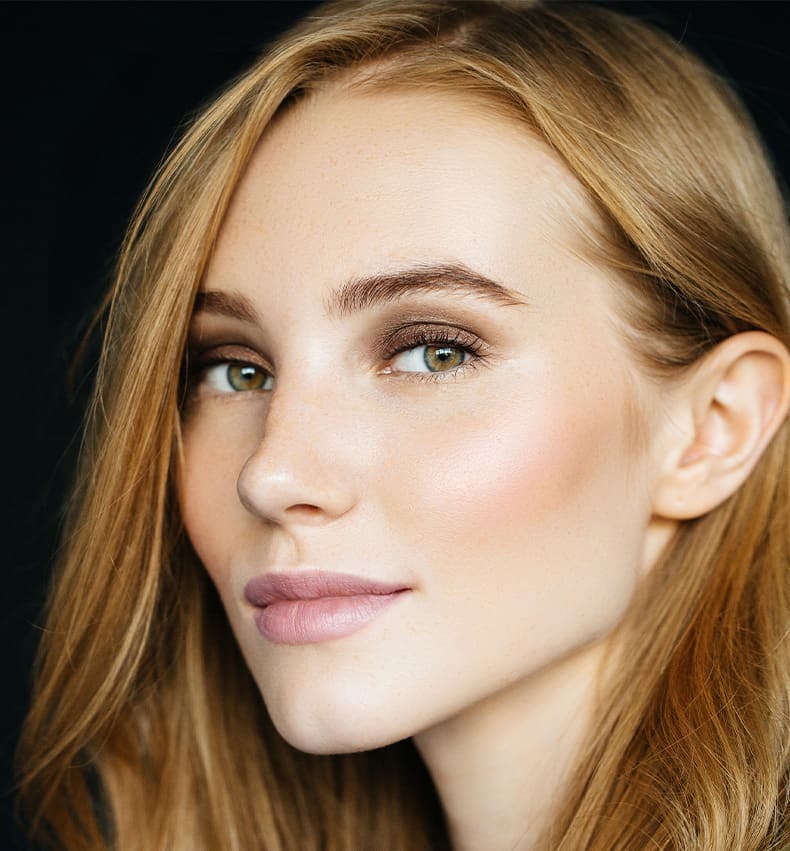 close up on woman's face looking forward