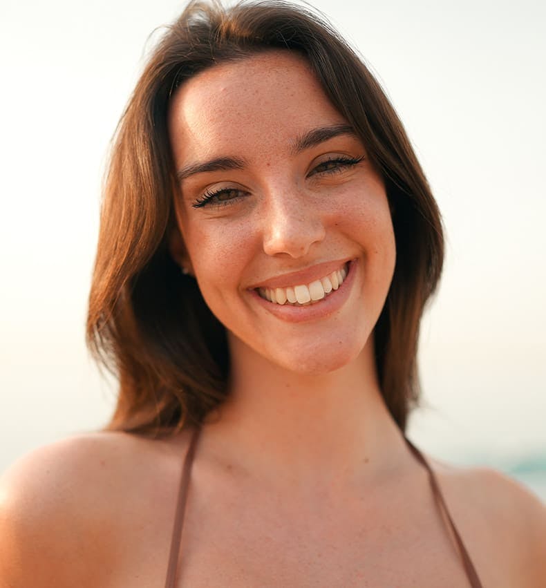woman looking forward and smiling