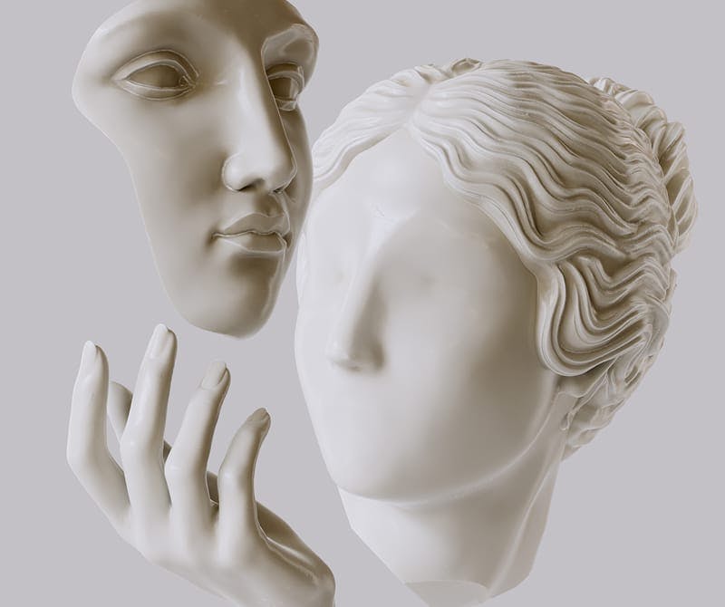 statue holding her face
