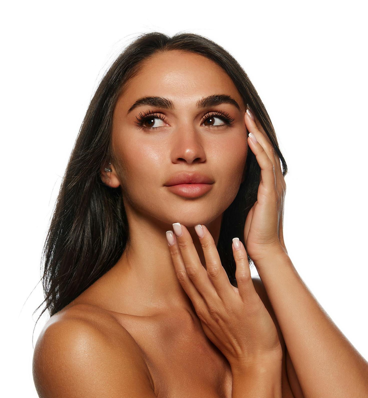 woman laying down and getting facial