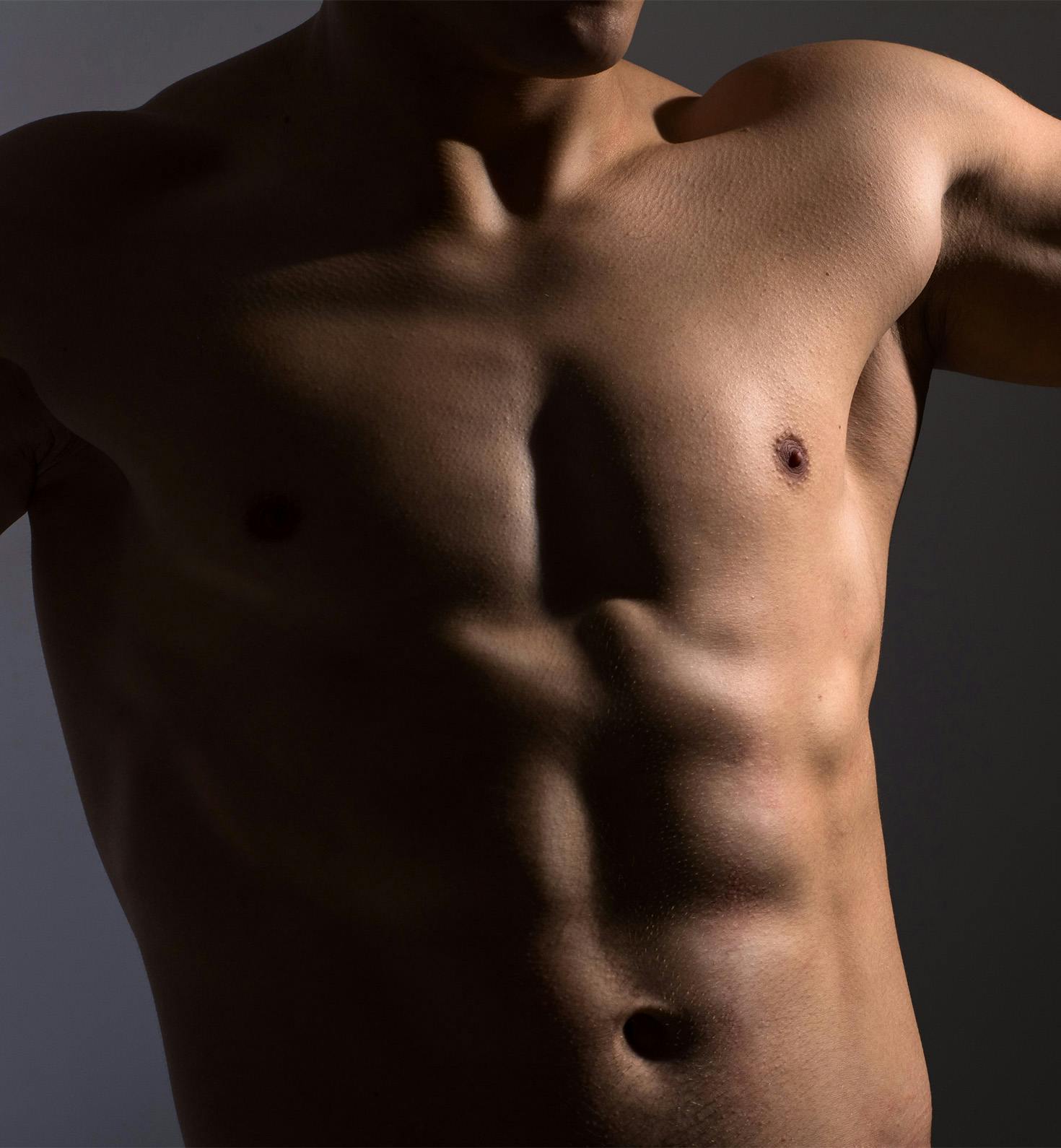 man's six pack and chest