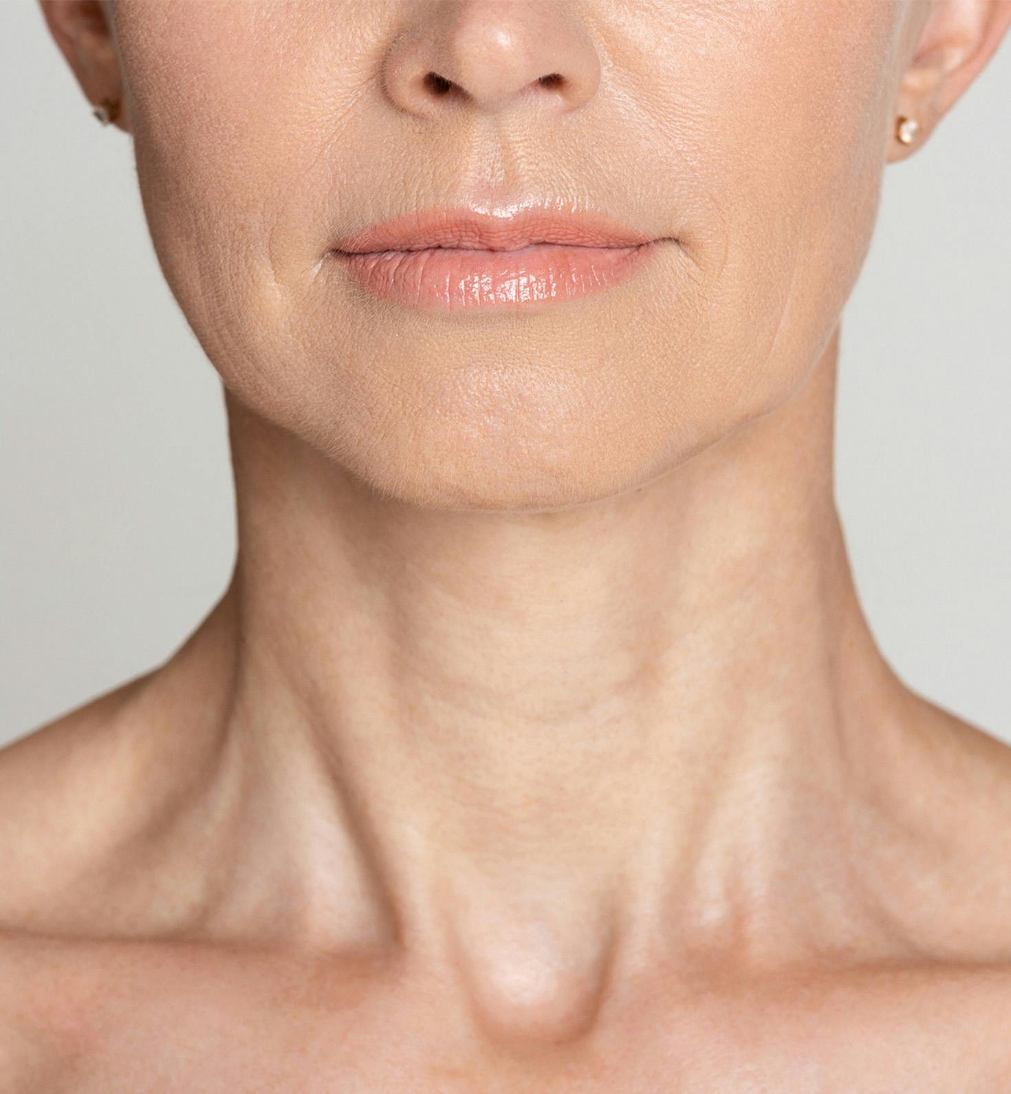 close up of woman's neck facing forward