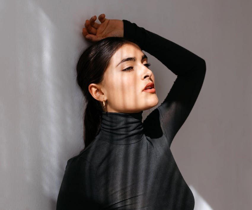 woman wearing a long sleeve black shirt