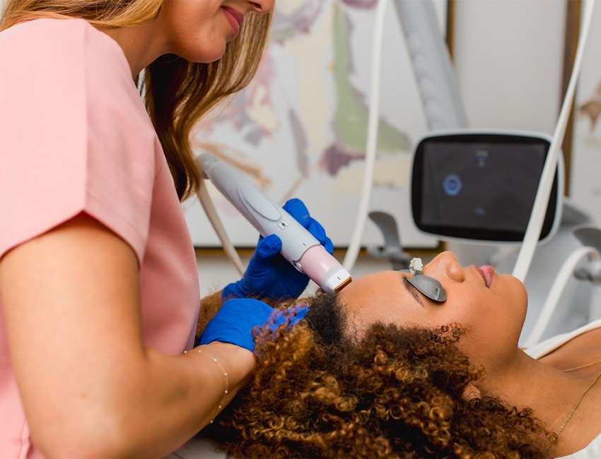 woman getting laser treatment done