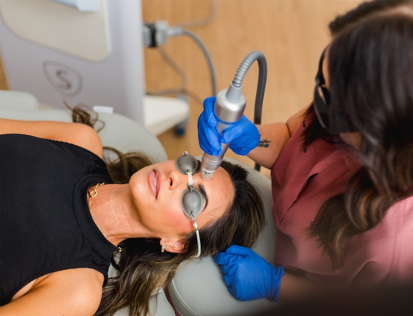 woman getting procdure on her face done