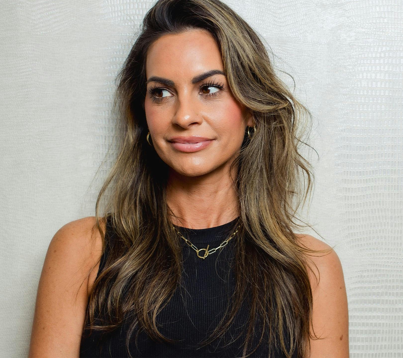 woman looking to the left but facing forward