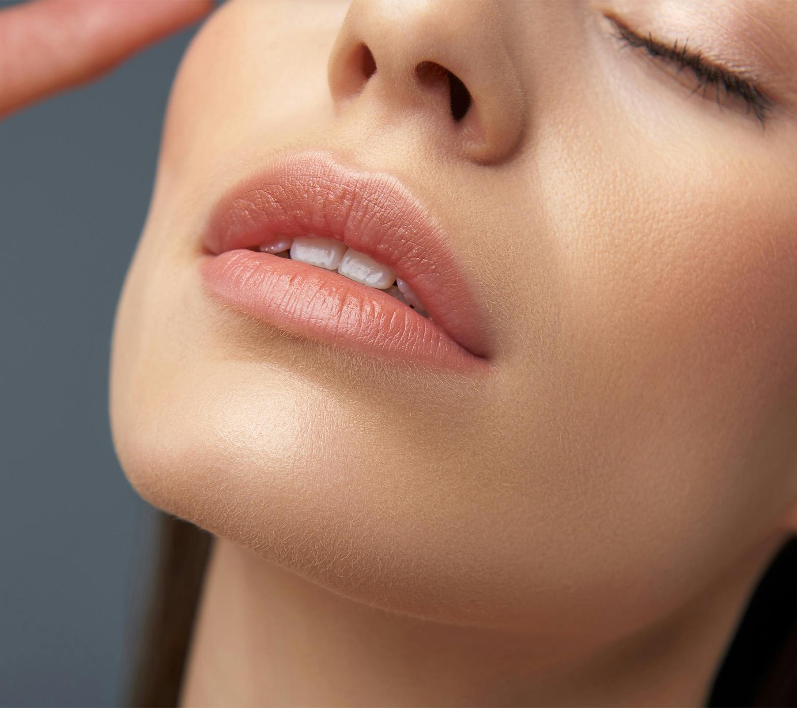 close up of womans lips