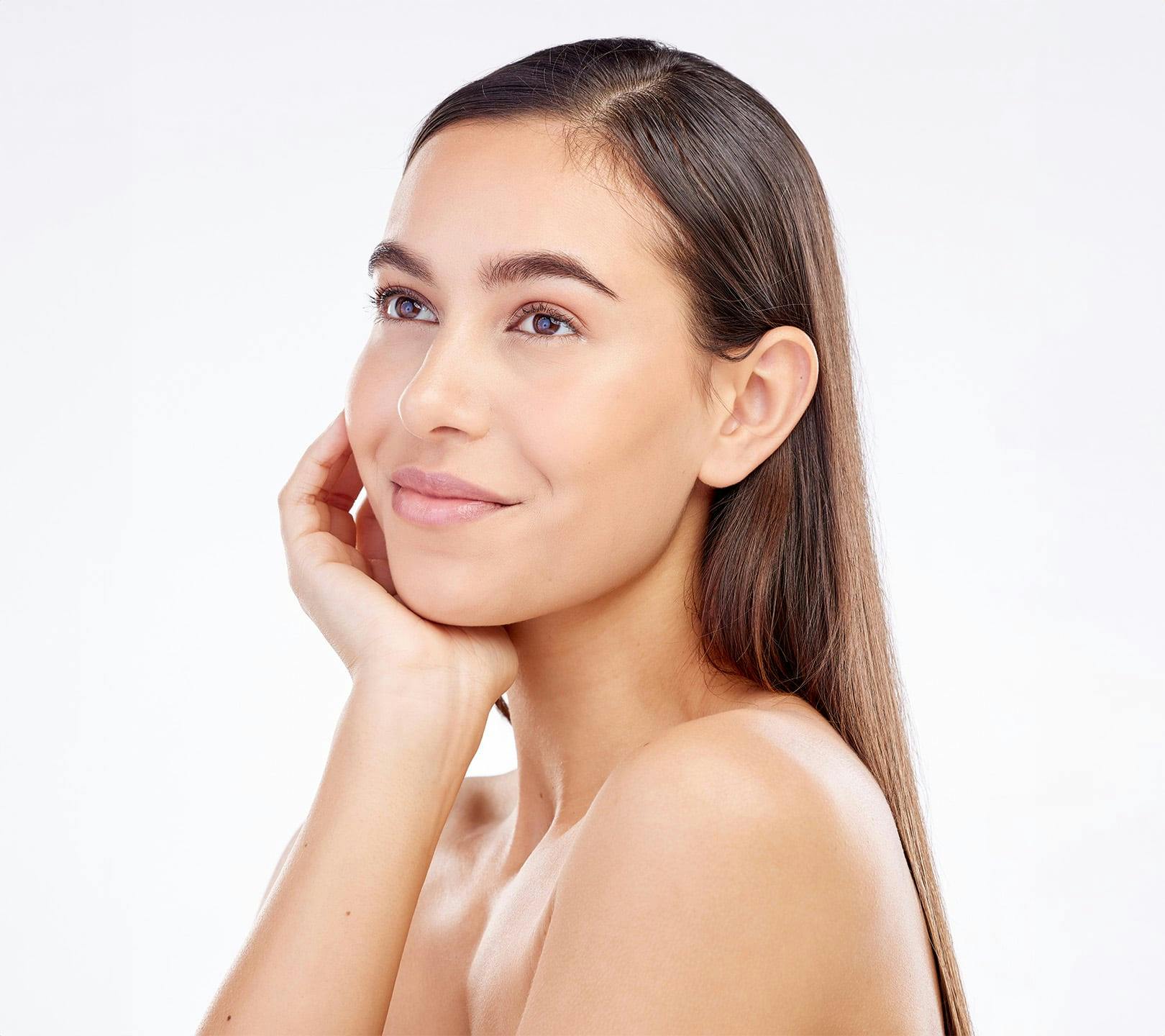 woman with her hand on her chin