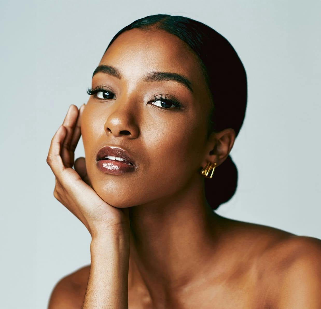 woman holding her head