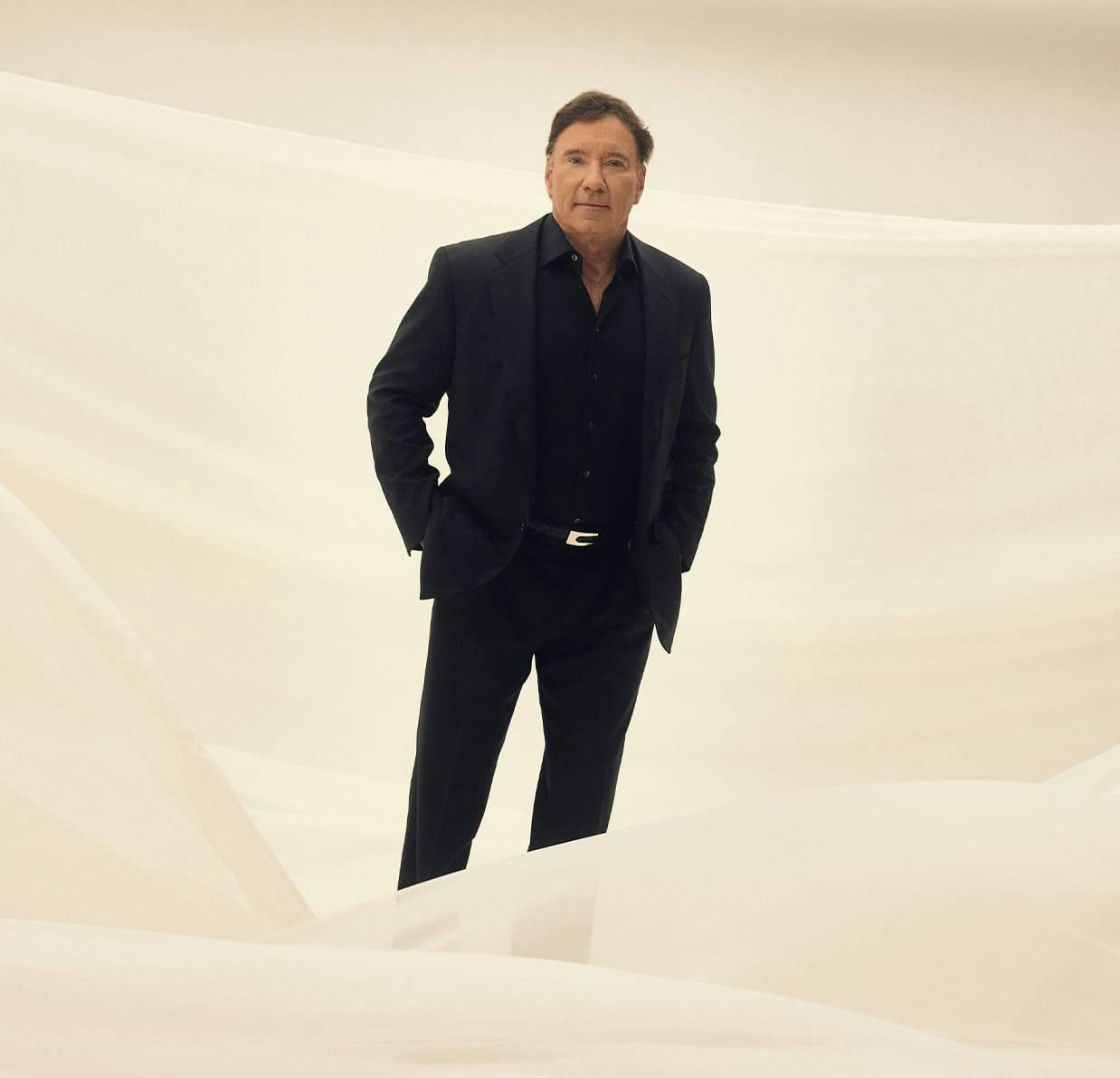 Dr. Garth standing with his hands in his pockets