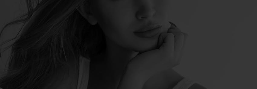 woman holding her chin